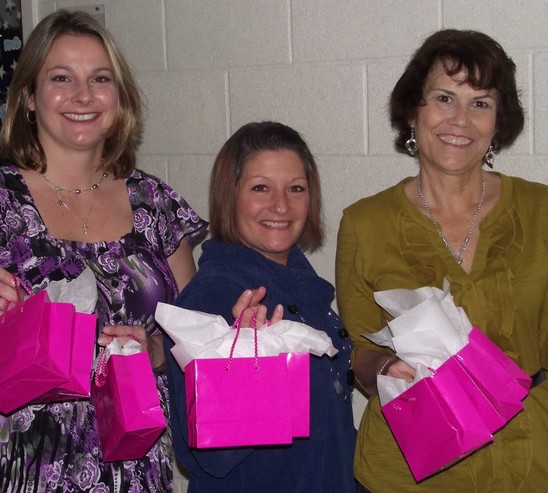 little pink bags Some of Cherished's volunteers carrying