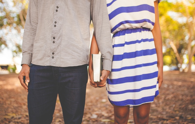 Couple holding Bible