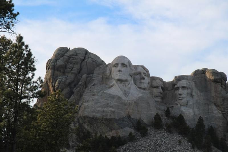 Mount Rushmore features US Presidents George Washington, Thomas Jefferson, Abraham Lincoln and Theodore Roosevelt.