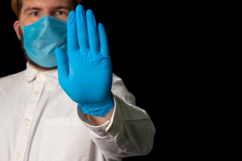 Man with mask and gloves