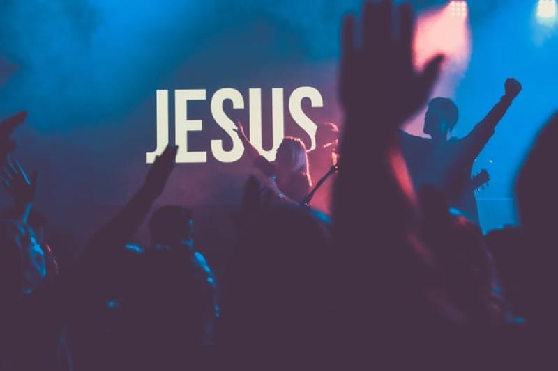 People worshiping Jesus Christ the Lord