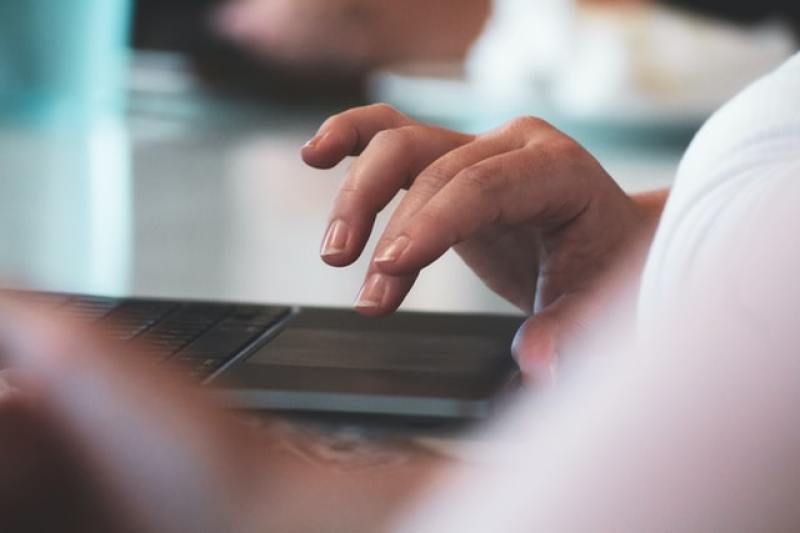 person using a laptop computer