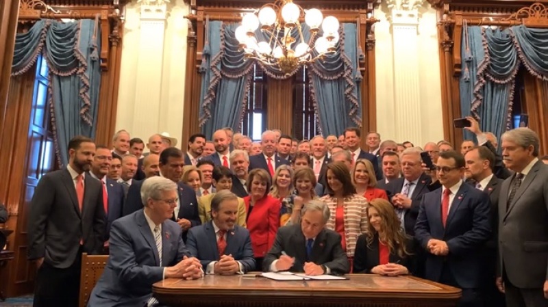 Texas Gov. Greg Abbott signing the Texas Heartbeat Act