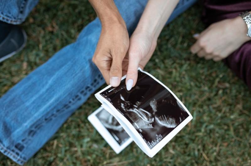 ultrasound showing baby inside a mother's womb